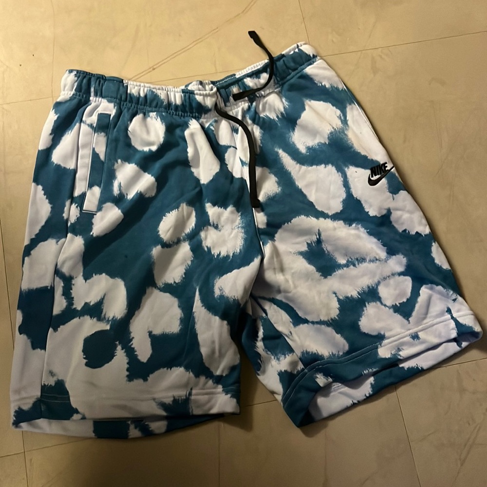Blue and white graphic nike shorts